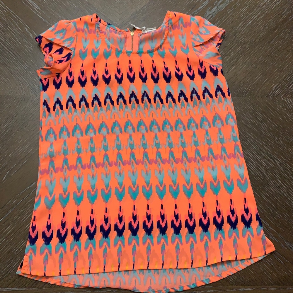 Neon orange print dressy top w/ zipper in back Size 8